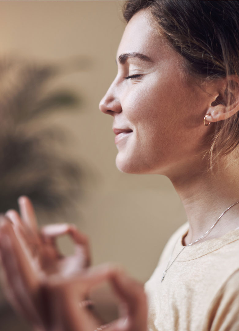 Epigenetisches Coaching: Meditierende Frau